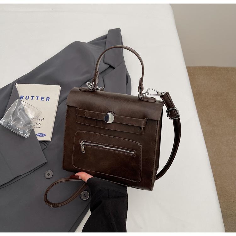 

Korean version of large-capacity commuter portable Kelly bag women s 2025 new trendy fashion casual shoulder messenger bag темно-коричневого кольору