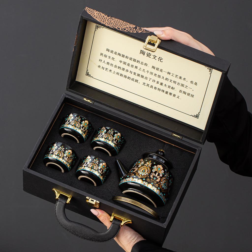Oriental Guochao gold and silver wrong black pottery lifting beam pot tea set gift box gift tea pot one pot four cups lo