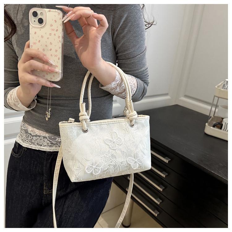 Minimalistische Spitzen-Schmetterlings-Handtasche mit Stickereien für Sommer-Casual-Outfits