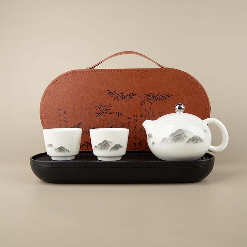 Sheep Fat Jade Portable Ceramic Tea Set - One Pot, Two Cups, Travel-Friendly Souvenir.