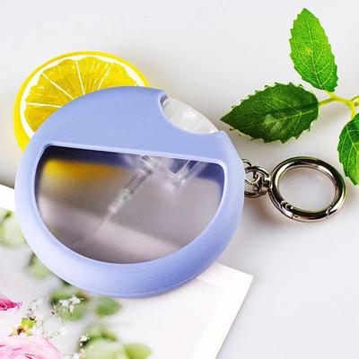 1 pièce 25 ml Bouteille de Parfum Ronde en Plastique Carte avec Couvercle Protecteur en Silicone Crochet Distributeur de Voyage Bouteille Rechargeable Outil Cosmétique