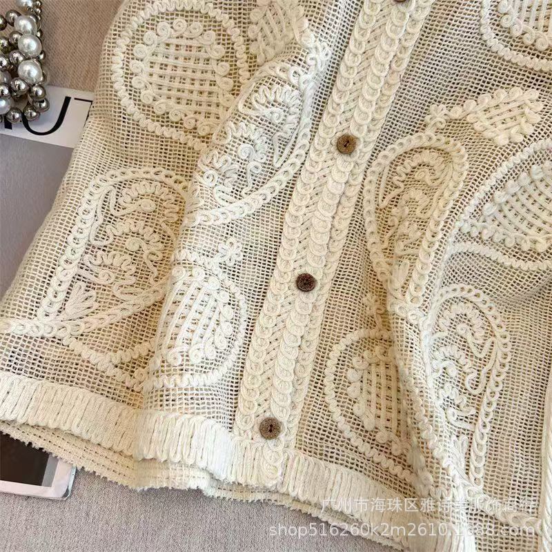 Foreign-style versatile hook flower hollow vest women's summer new V-neck high-end sleeveless stacked loose top