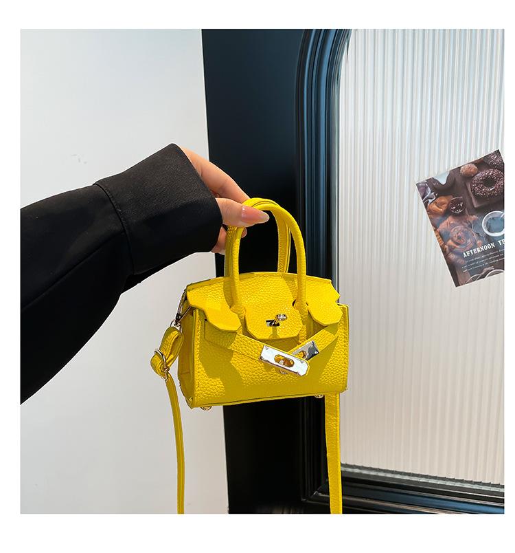 

New Korean version lock children s bag simple fashion change bag Internet celebrity mini parent-child foreign style messenger bag жёлтый