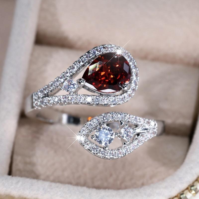 

Eryun new temperament palladium white K water drop pomegranate red open ** fork ring opening adjustable