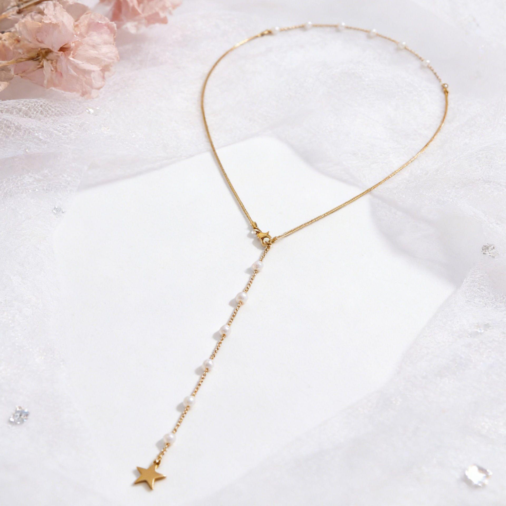 Элегантное двуслойное колье-цепочка  Змеиная кость  с кисточкой из искусственного жемчуга