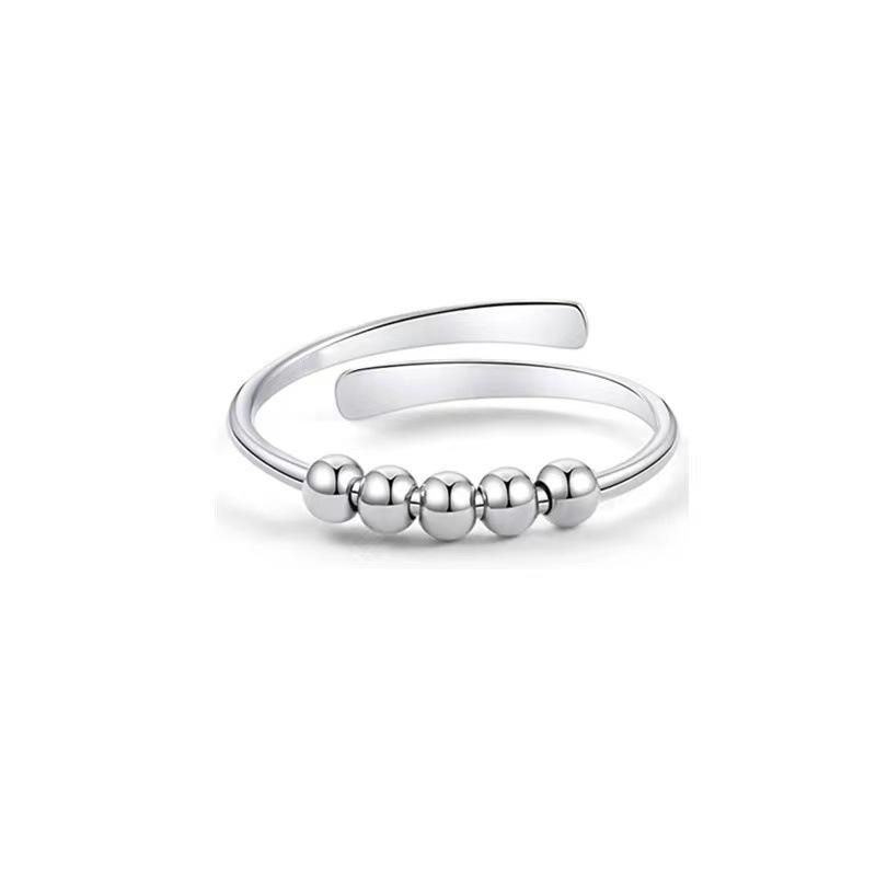 Stilvoller 8-förmiger Zirkonia-Angstlösungs-Spinnerring