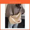 Minimalist Canvas Shoulder Bag With Sewn Detailing And Spacious Interior For Commuting