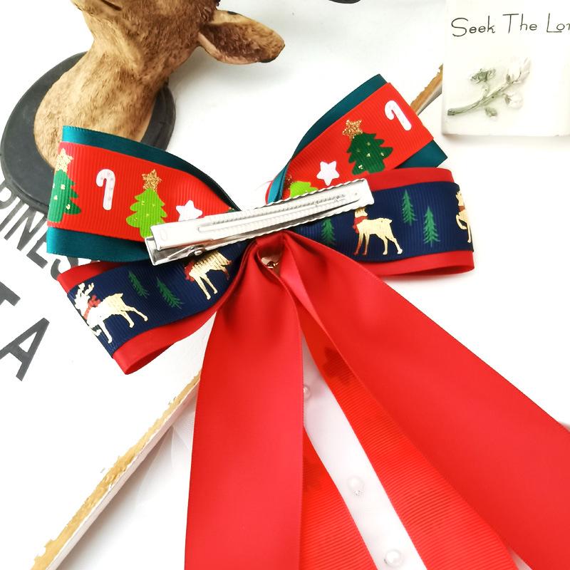 Świąteczna kokarda, wstążka, spinka do włosów z motywem Świętego Mikołaja, misia i renifera