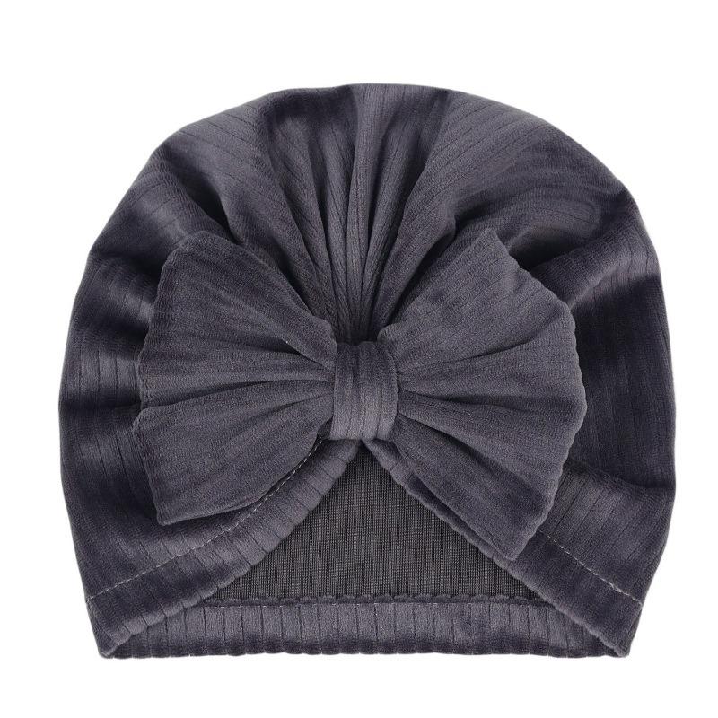 

Autumn and winter children s hats solid color bow baby pullover hat children s simple and cute corduroy Indian hat