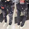 Mens Slim Fit Jeans Punk Style Distressed Printed Denim Pants Teens Casual Wear