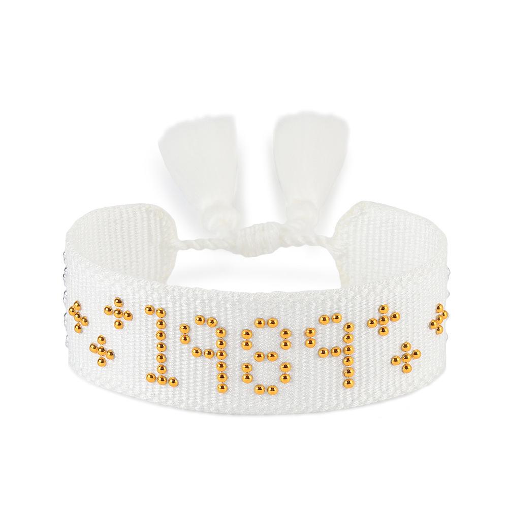 

Stylish Women s Tassel Woven Bracelet with Half-Circle Stamped Charm