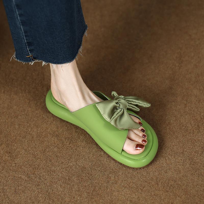 

Soft-soled shit-stepping bow flat-soled sandals, new thick-soled women s cool slippers for women s summer wear in the summer of 2025 40