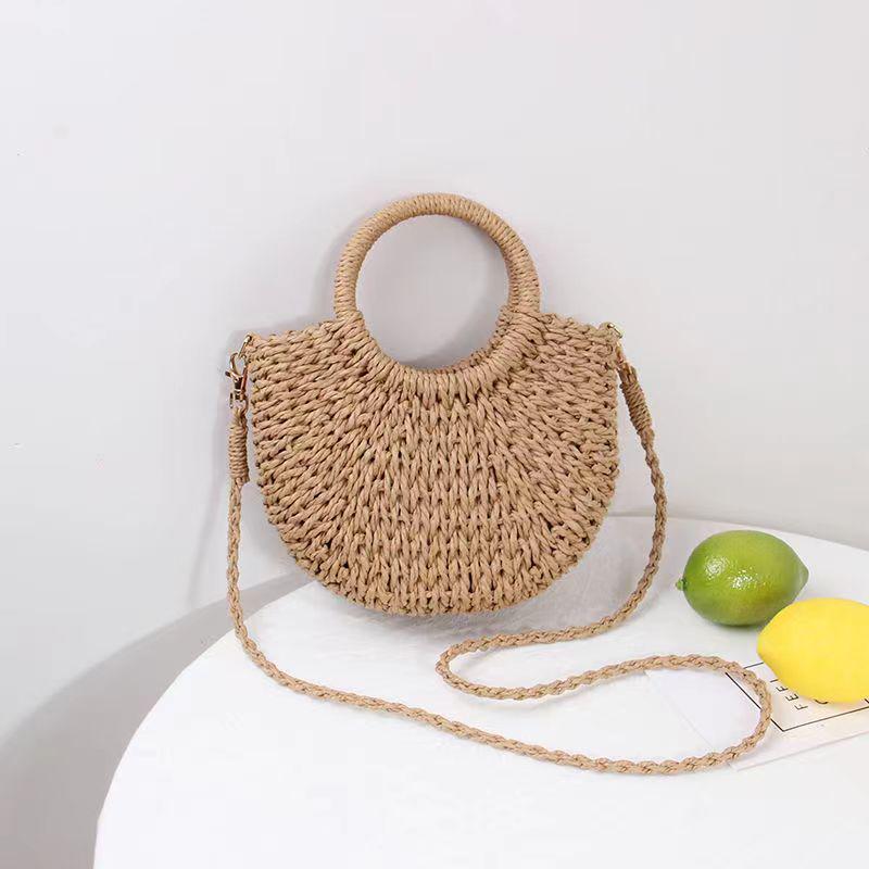 

Жіноча пляжна сумка ручної роботи з соломи та ротанга