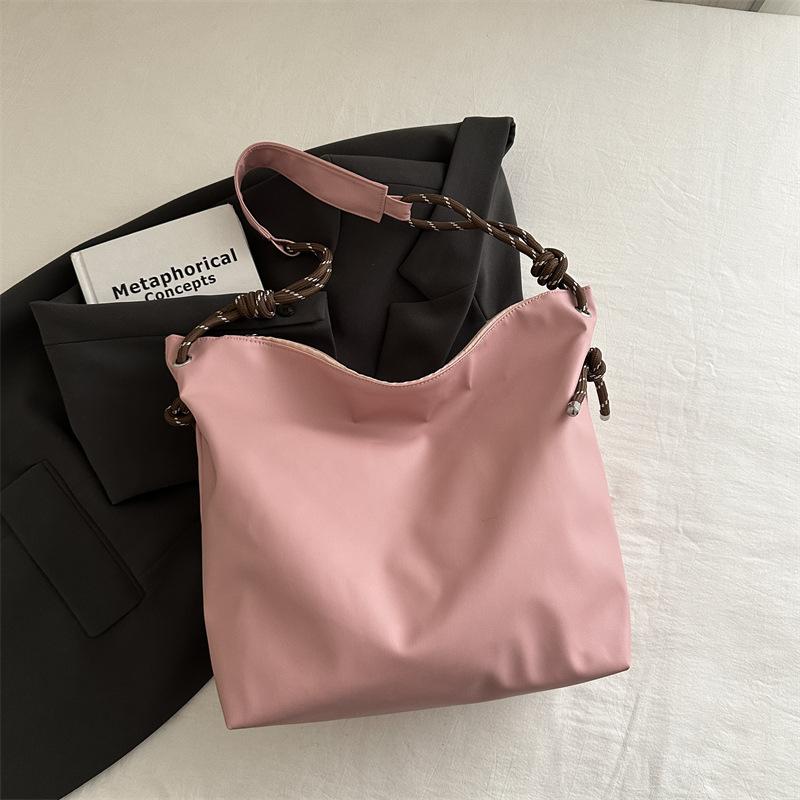 

Мягкая кожа большая вместимость сумка через плечо 2025 новая популярная сумка-тоут для поездок на работу