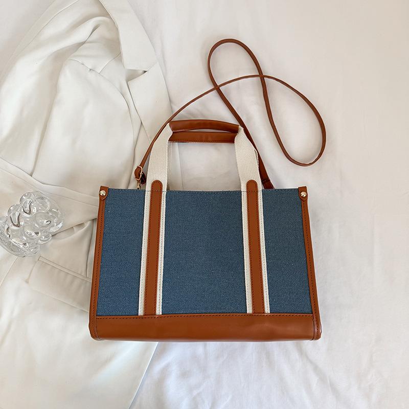 

Large capacity canvas bag women s new fashion portable commuter bag tote bag simple broadband messenger bag