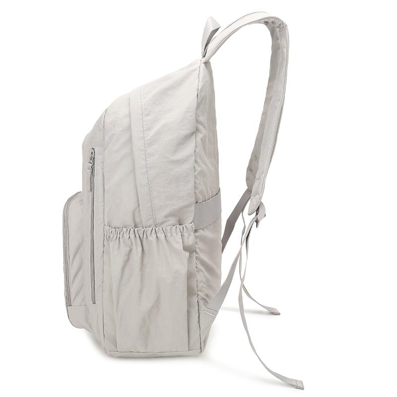 Ryggsäck i enfärgat dam lätt utomhusryggsäck stor kapacitet student skolväska