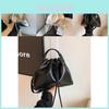 Stilvolle Eimertasche für Damen in Schwarz, Silber und Weiß, perfekt für Frühlings- und Sommer-Freizeitoutfits
