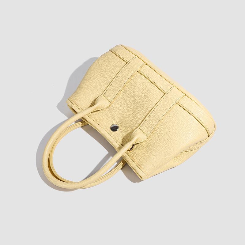 Casual Simple Small Bag Women's New Spring Niche Design Fashion Trend Shoulder Messenger Bag Bucket Bag