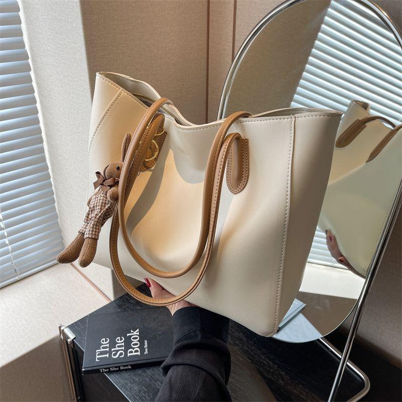 

Bag Female Advanced Texture Niche Style Work Shoulder Bag Rice white belt pendant