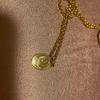Used Q-POt banana chocolate necklace
