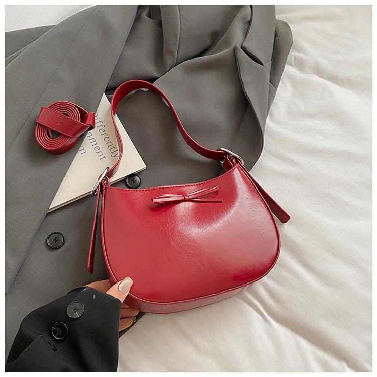 2025 new high-value bow design underarm bag Korean version niche simple casual portable shoulder bag women's bag