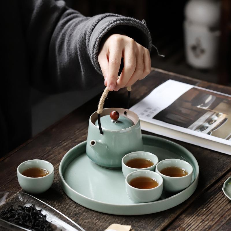 Jianying Chinese-style tea set for home use, modern living room simplicity, one pot and four cups for brewing tea, small ceramic kung fu tea set