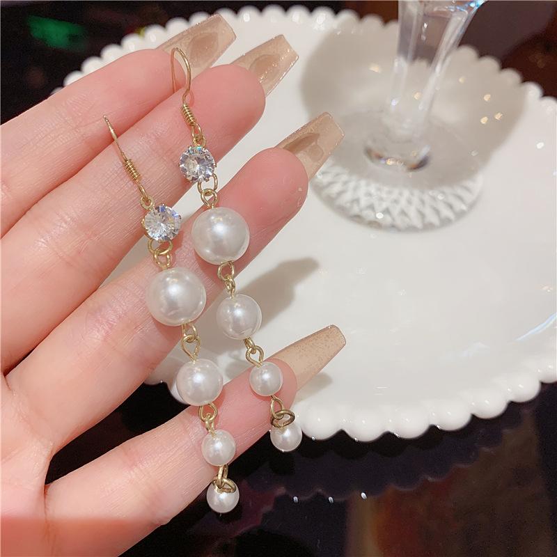 Silver needle temperament pearl earrings for women, showing their faces, long and thin fringed earrings, earrings. 925 silver needle