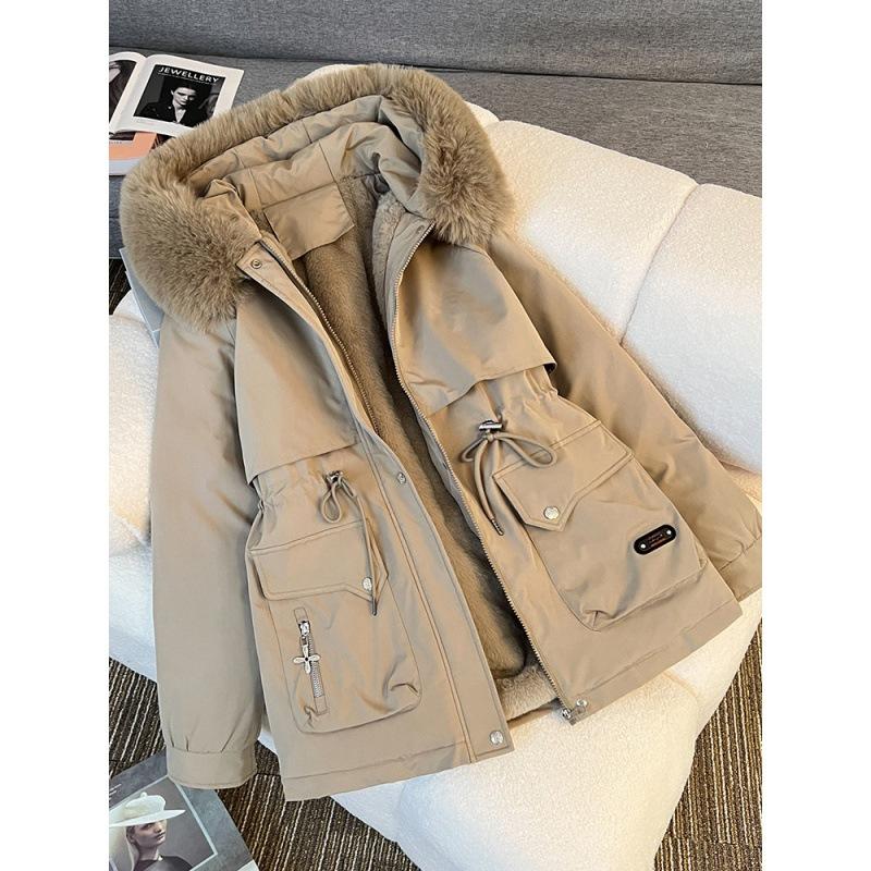 Medium and long pie overcomes women's new cotton clothes, winter fashion cotton-padded clothes, loose velvet and thickened large fur collar jacket.