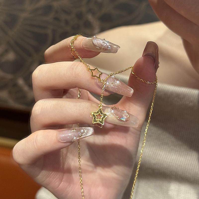 Classic hollow out sparkling star tassel necklace crushed ice cute collarbone chain Suitable for daily light luxury