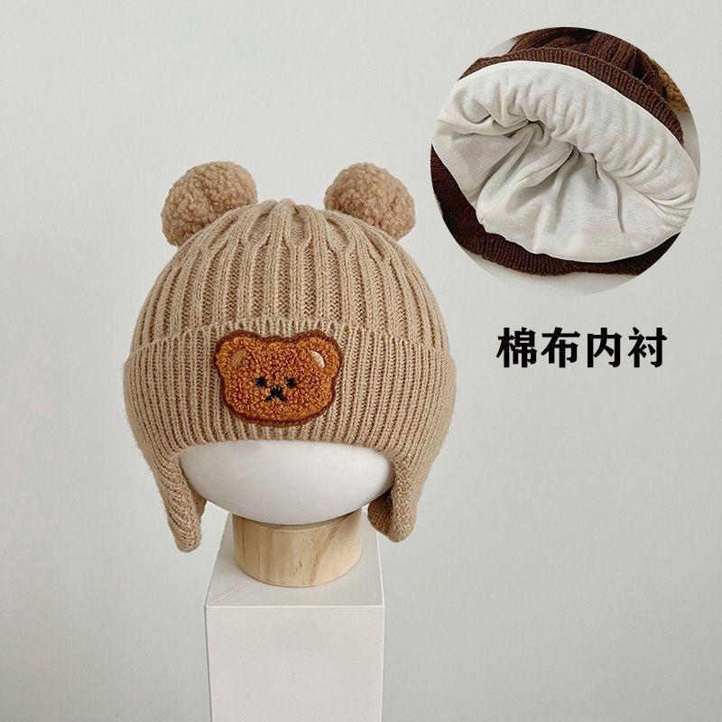 Super cute baby autumn and winter new children's thermal hat cute double ball hat warm ear protector knitted wool hat