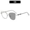 Cat-eye photochromic sunglasses—sun-protective shades for outdoor vacations.
