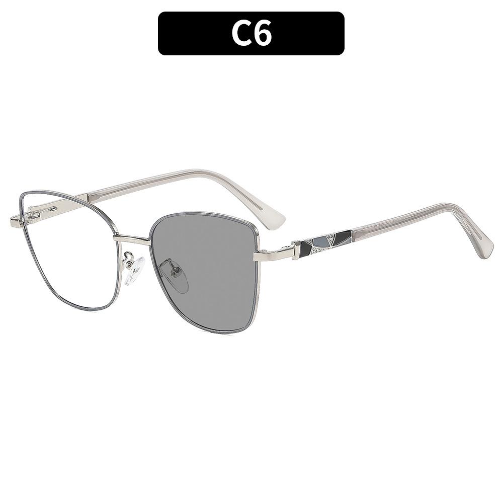 Cat-eye photochromic sunglasses—sun-protective shades for outdoor vacations.