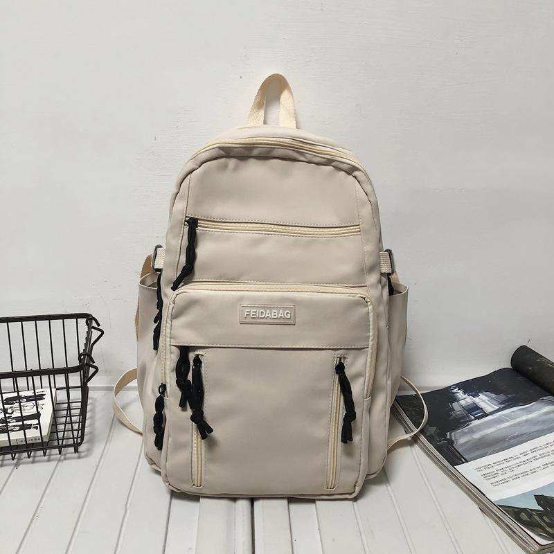 

Middle school student backpack, new large-capacity simple nylon outdoor couple backpack, junior high school student schoolbag белый