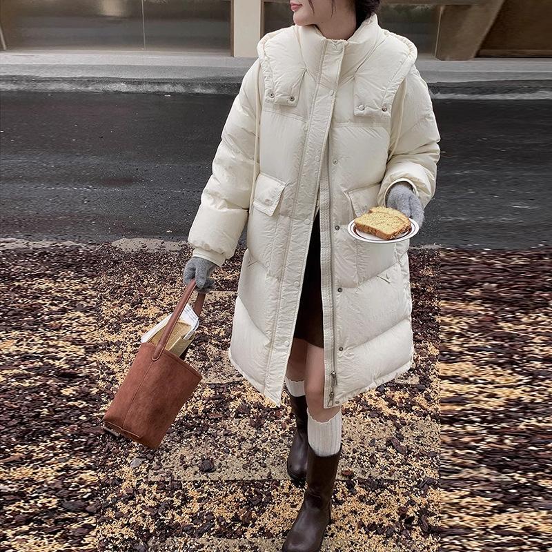 Lange Daunenjacke mit großer Tasche für Damen 2025 Wintermode Verdickte Kapuze Über Knie Süße weiße Entendaunenjacke
