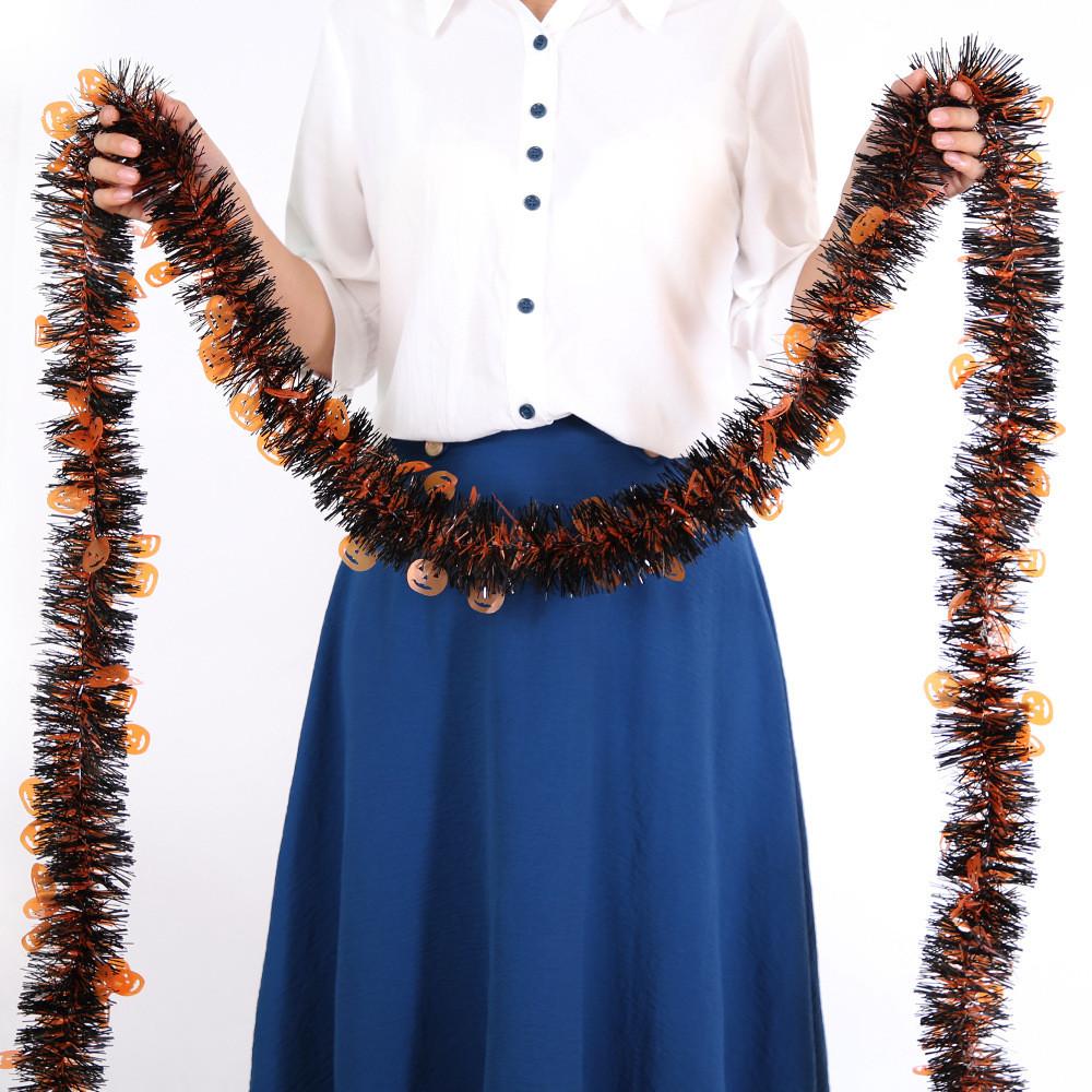 Party Festive Halloween Decorations With Colorful Hanging Streamers Of Pumpkins Bats And Skulls For A Creepy Vibe