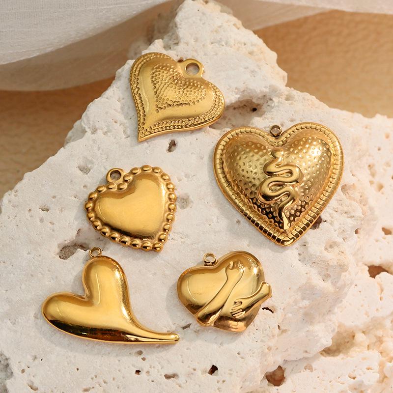 Cross Retro Stainless Steel Heart Pendant Jewelry Collection: Bracelet, Necklace, Earrings, Charms