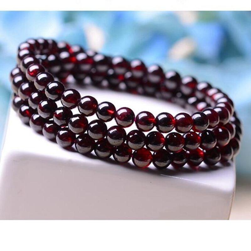 

Натуральные подлинные товары Браслет из граната винного цвета Многослойный кристалл круглые бусины Украшение Мужские и женские браслеты Три кольца Подарок Ванфу Women s three-circle 5.5mm bead diameter