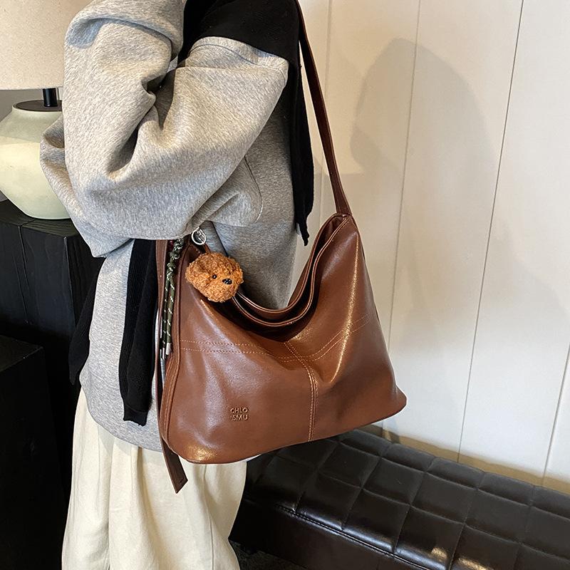 

Fashion Trend Women s Bag Tote Bag Women s 2025 New Large Capacity Slack Shoulder Crossbody Bag 36*13.5*27 коричневый