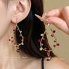 High-End Ethnic Teardrop Tassel Earrings with Cutout Design – Luxury Trend Jewelry
