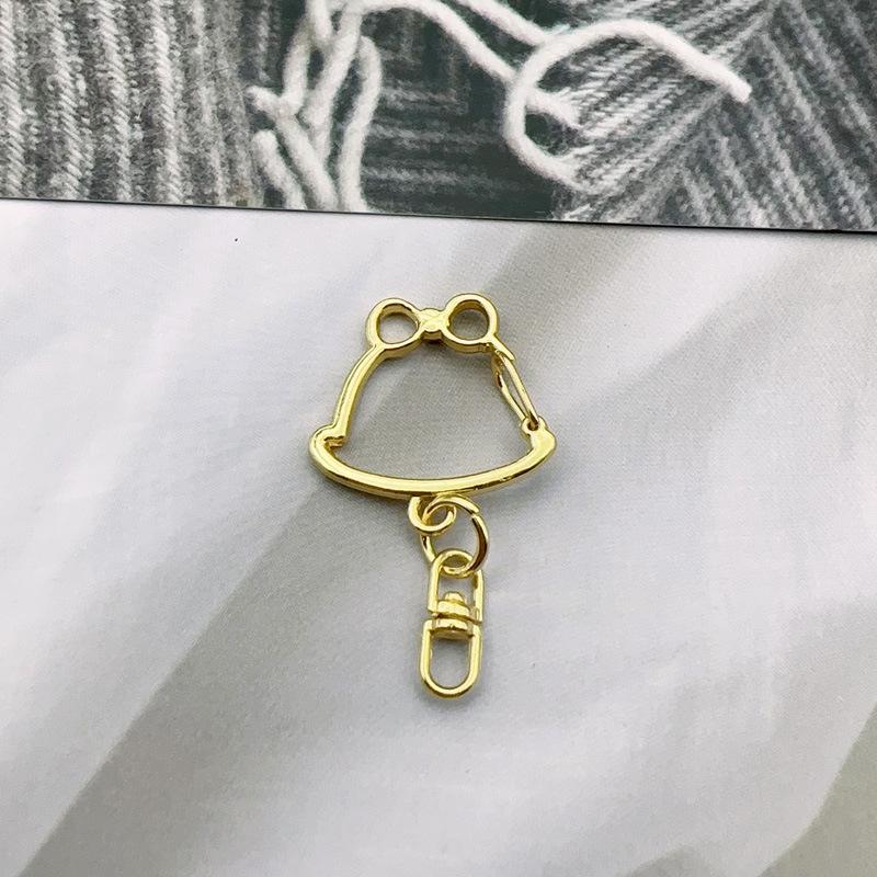 Handmade Metal Rotating Chick Keychain with Christmas Bell and Color Retention.