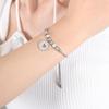 Women's Cute Japanese-Korean Fashion Bracelet: Hollow Heart Pendant, Round Bead, Real Gold Titanium Steel Jewelry