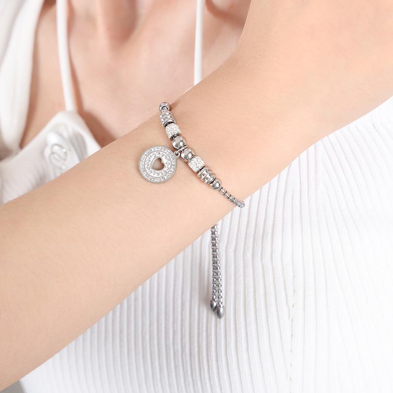 Women's Cute Japanese-Korean Fashion Bracelet: Hollow Heart Pendant, Round Bead, Real Gold Titanium Steel Jewelry