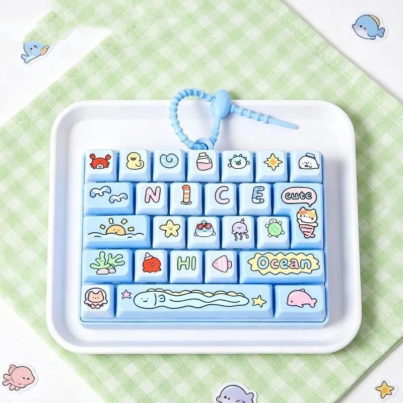 26-Tasten Fidget-Button Schlüsselanhänger BPA-freies sensorisches Dekompressionsspielzeug Wasserdichter Taschenanhänger für Outdoor-Ausflüge