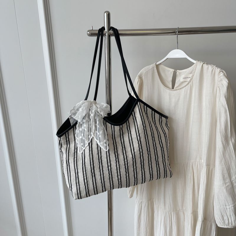 

Повседневная сумка большой вместимости для женщин 2025 Новое поступление Рабочая одежда Универсальная холщовая сумка через плечо Школьная сумка для студентов Сумка-тоут Creamy-white Scarf