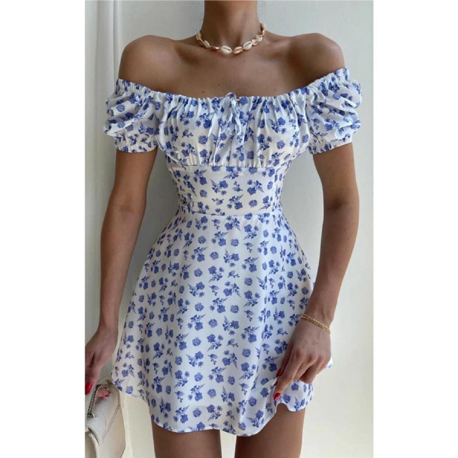 

Біла сукня з блакитними квітами та коміром S білий