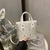 New Wanji pattern portable bucket bag high-end light luxury versatile shoulder messenger bag women