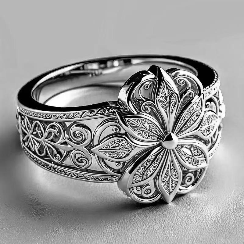 Exquisite Hollowed-out Floral Niche Design Engraved Ring with Unique Style, Suitable for Various Occasions.
