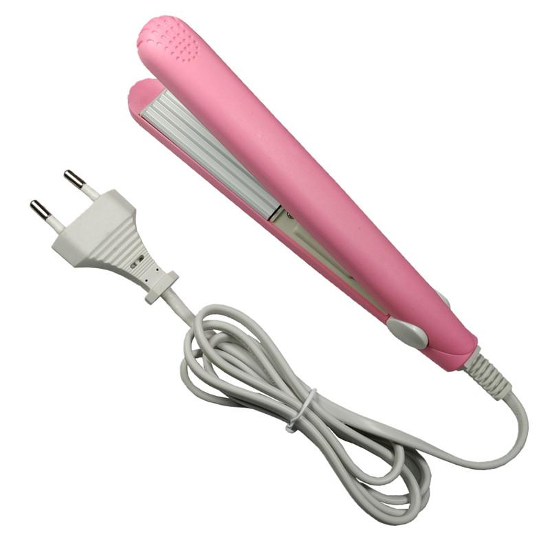 A mini hair iron pink corrugated plate electric curling iron curl modelling tools Good product 1