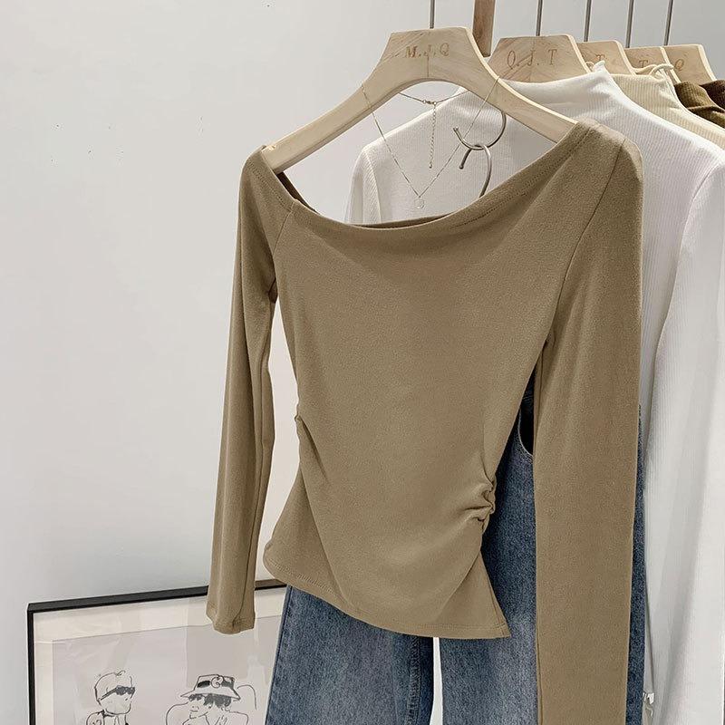 Early spring niche unique off-the-shoulder diagonal-neck bottoming shirt women's card waist pleated pure desire wind long-sleeved T-shirt top