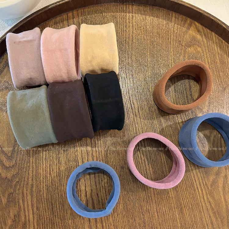 Hochelastisches Haargummi: Damen-Stirnband mit breiter Kante für Pferdeschwanz